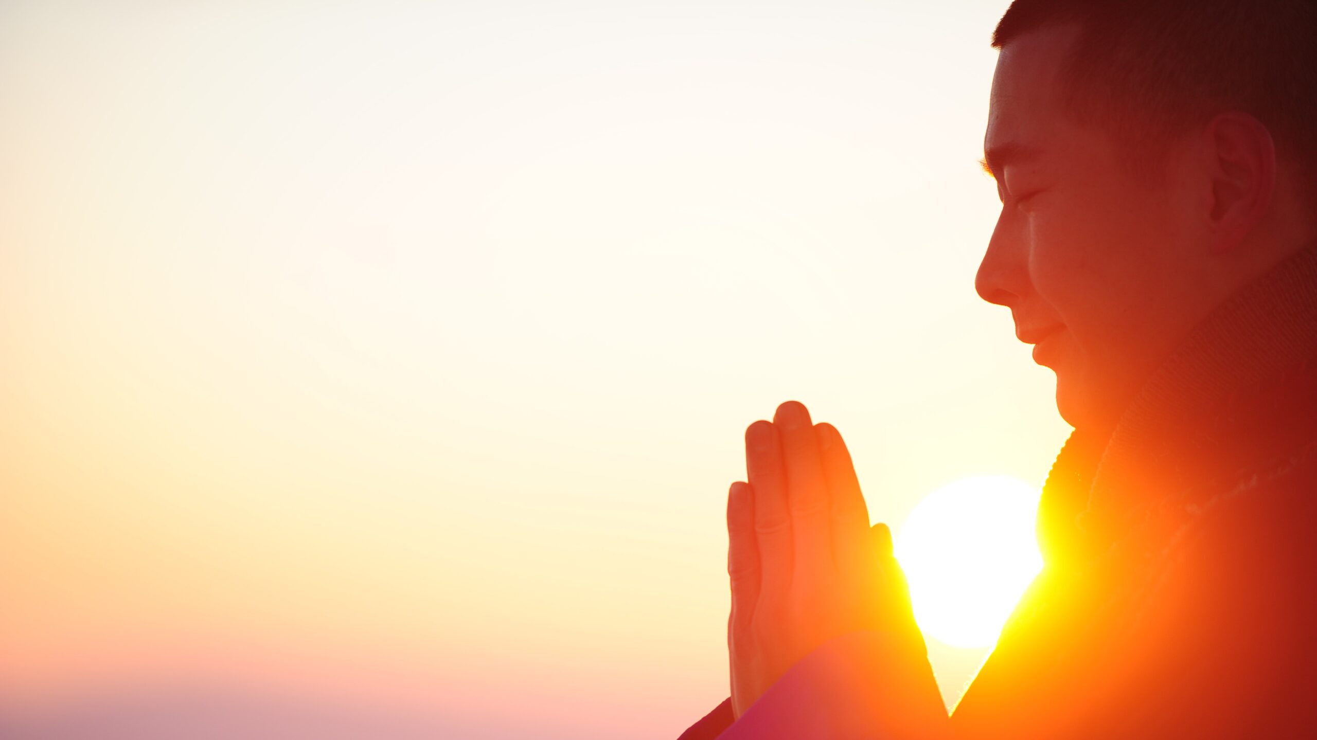 A buddhist monk praying