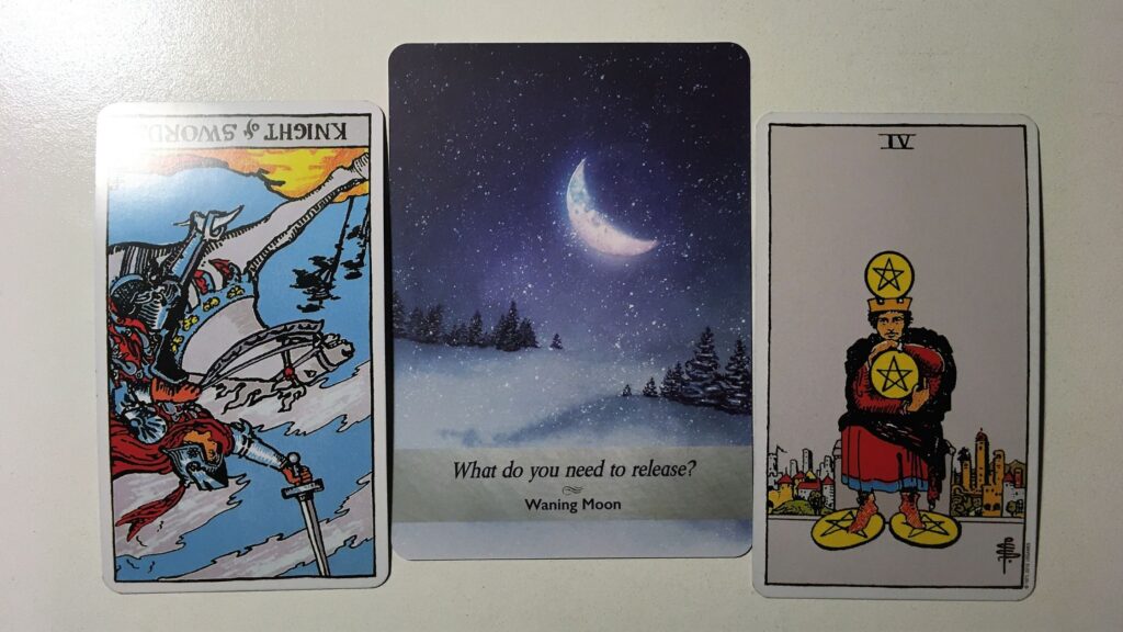 Oracle card and two tarot cards