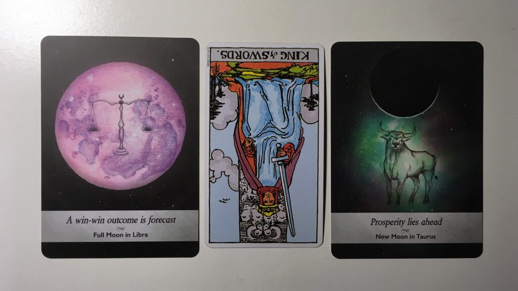 Tarot card and two oracle cards