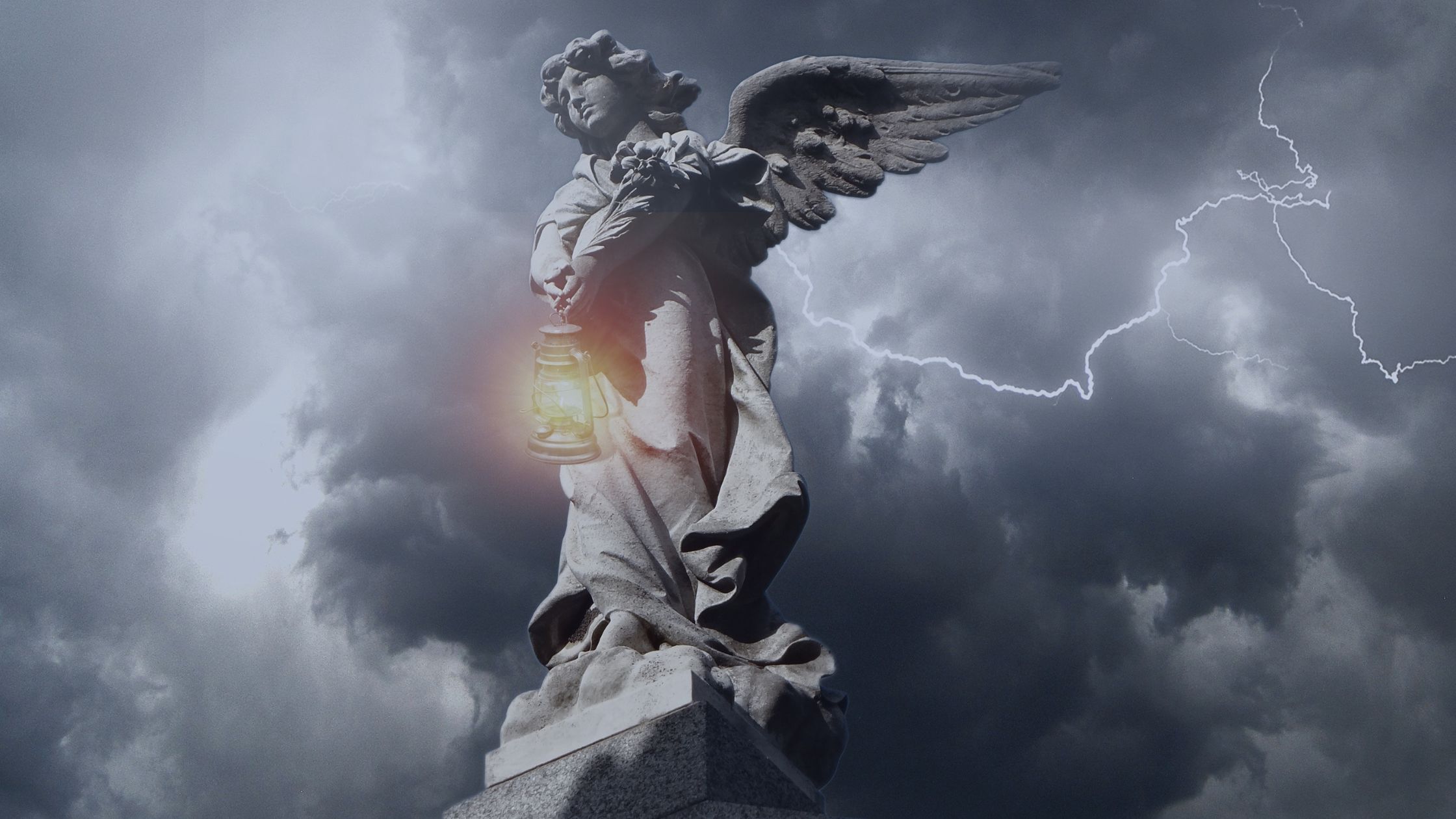 Angel statue in a thunderstorm