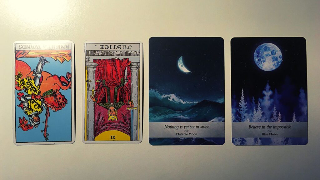 Two tarot cards and two oracle cards