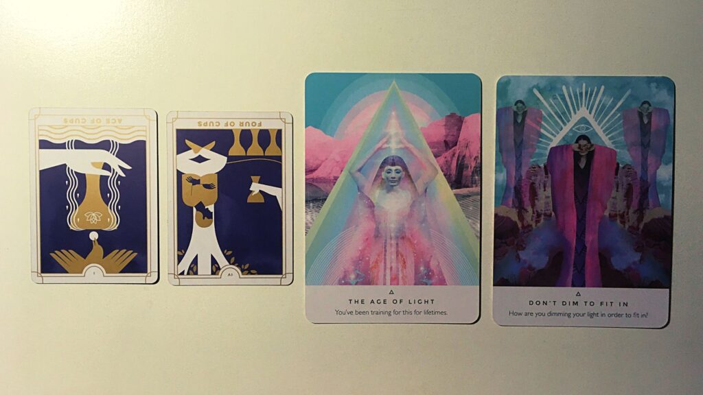 Two tarot cards and two oracle cards