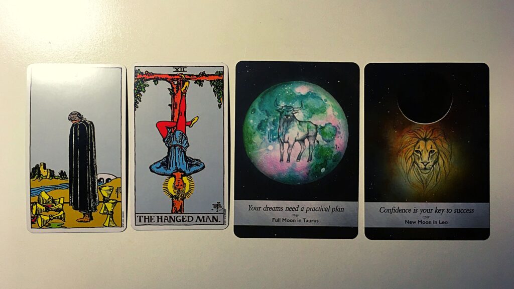 Two tarot cards and two oracle cards