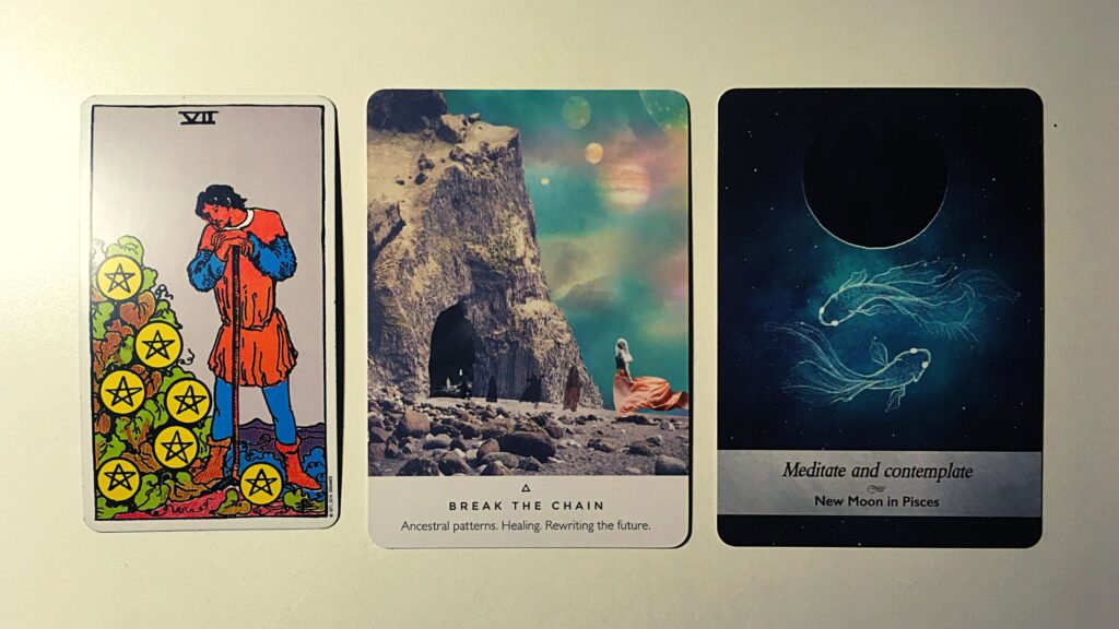 Tarot card and two oracle cards