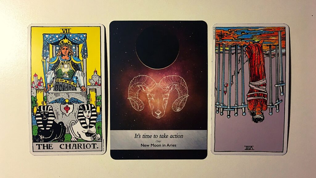 Two tarot cards and an oracle card