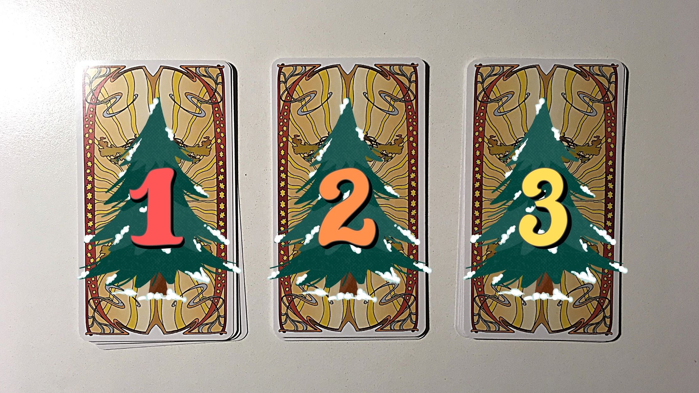 Three tarot pick a card piles with pine trees on them