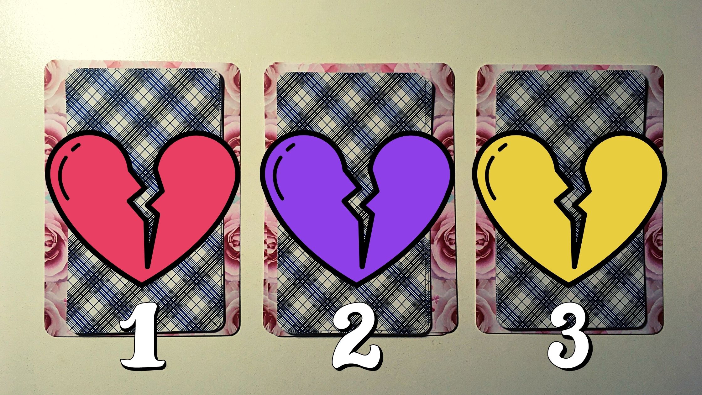 Three tarot and oracle pick a card piles with hearts on them