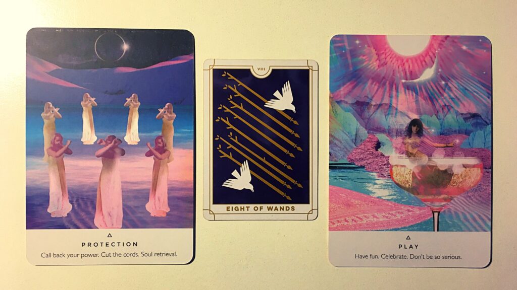 Tarot card and two oracle cards