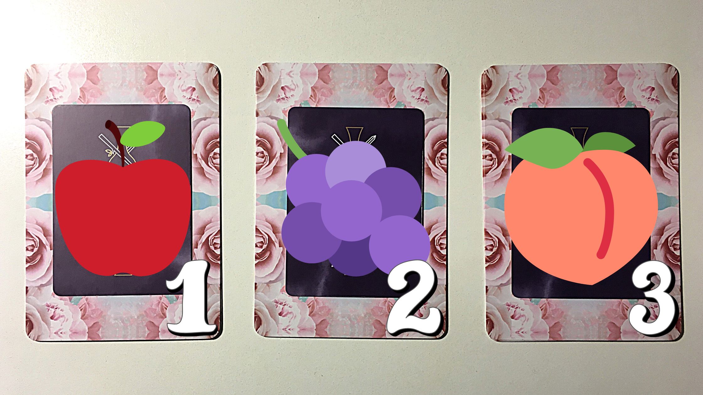 Three tarot and oracle pick a card piles with fruit on them