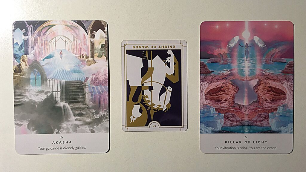 Tarot card and two oracle cards