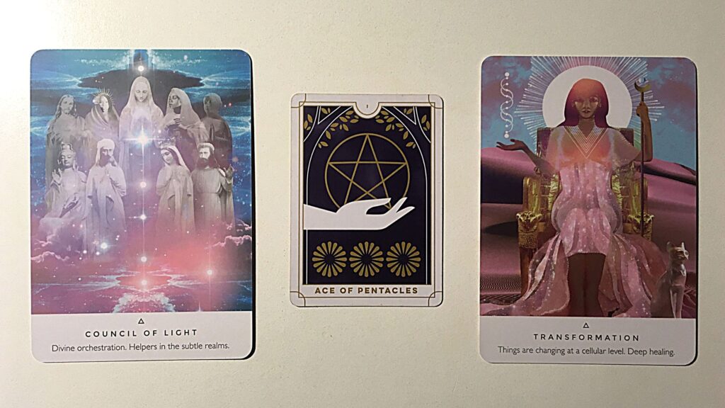 Tarot card and two oracle cards