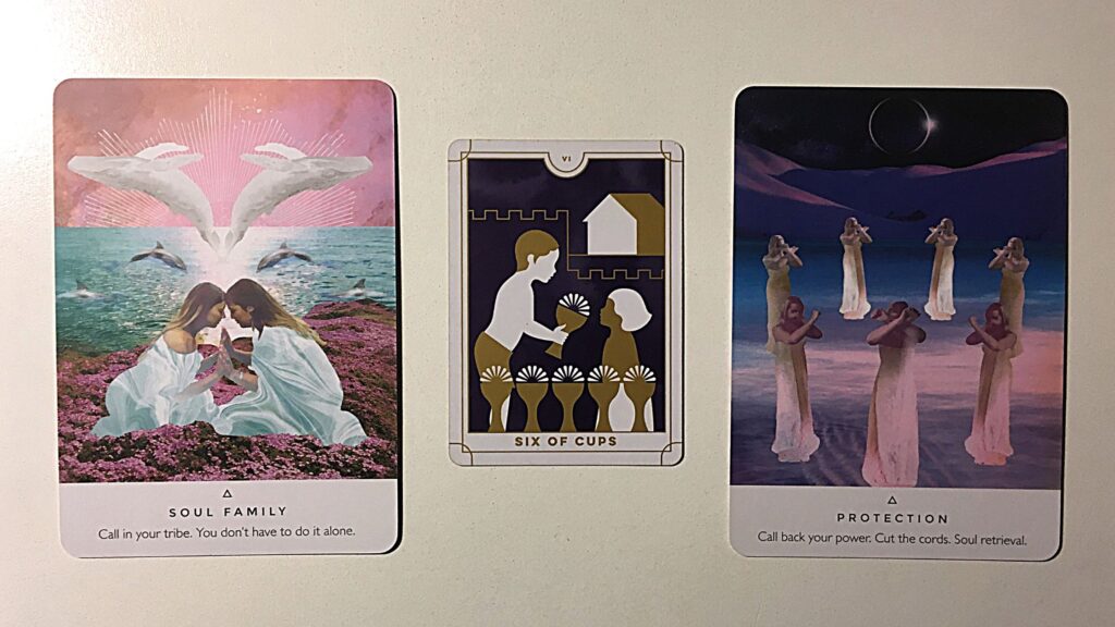 Tarot card and two oracle cards