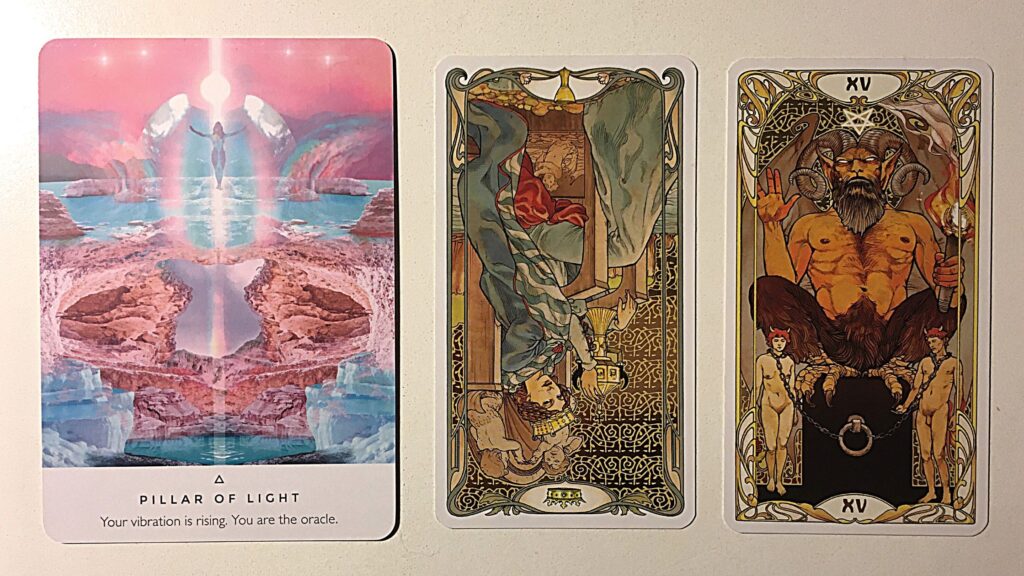 Oracle card and two tarot cards