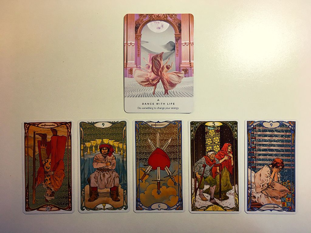 Oracle card and five tarot cards