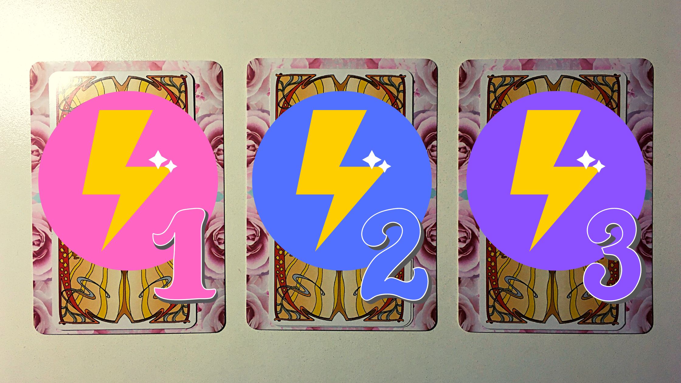 Three tarot and oracle pick a card piles with energy bolts on them