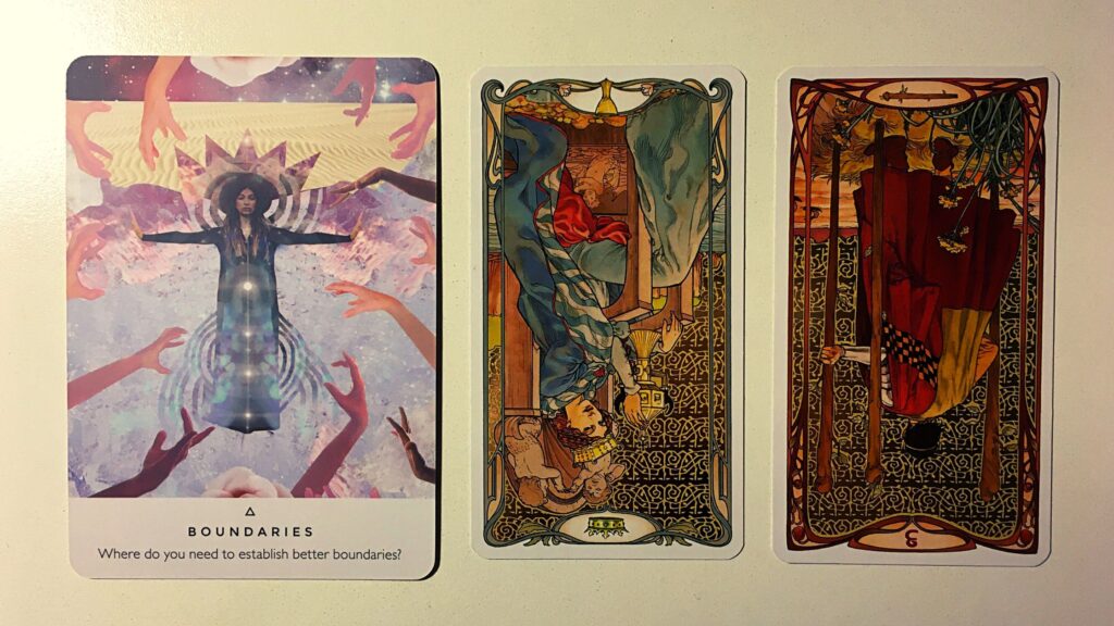 Oracle card and two tarot cards