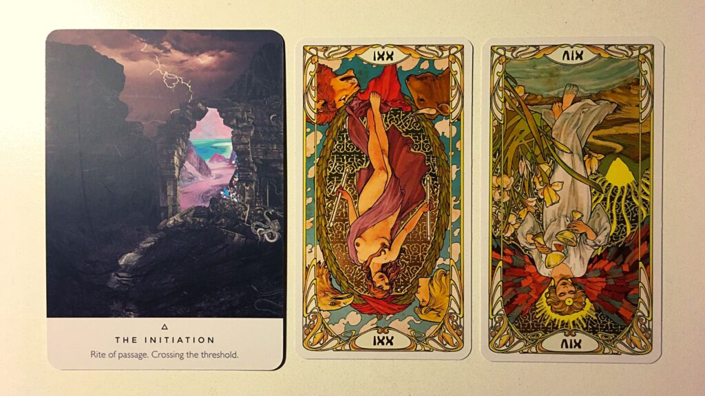 Oracle card and two tarot cards