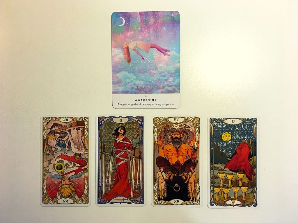 Oracle card and four tarot cards