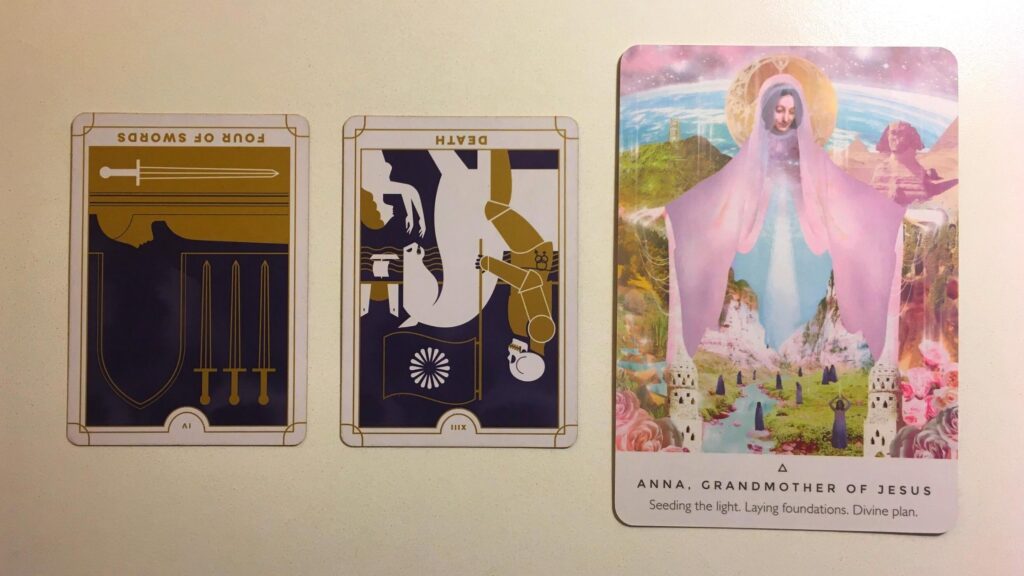 Four of Swords, Reversed and the Death, Reversed card from the Everyday Tarot deck; Anna, the Grandmother of Jesus card from the Work Your Light oracle deck