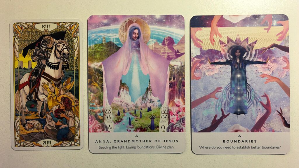 The Death card from the Golden Art Nouveau Tarot deck; the Anna, Grandmother of Jesus and Boundaries card from the Work Your Light Oracle deck