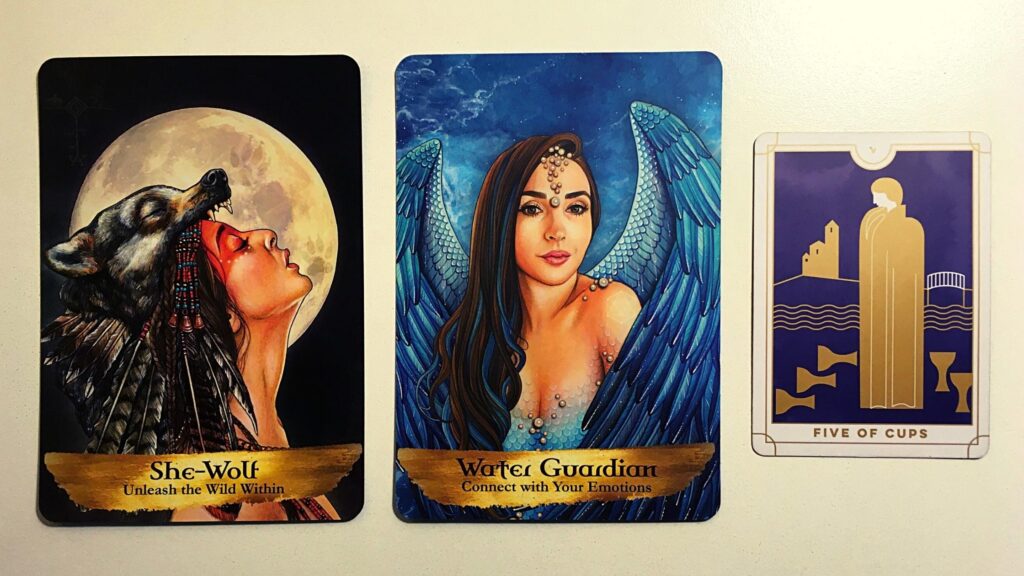 She-Walf and Water Guardian cards from the Angels and Ancestors Oracle Deck; the Five of Cups from the Everyday Tarot