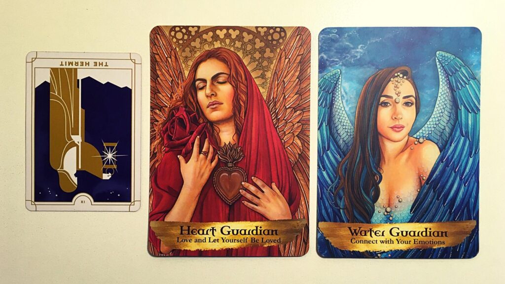 Tarot card and two oracle cards