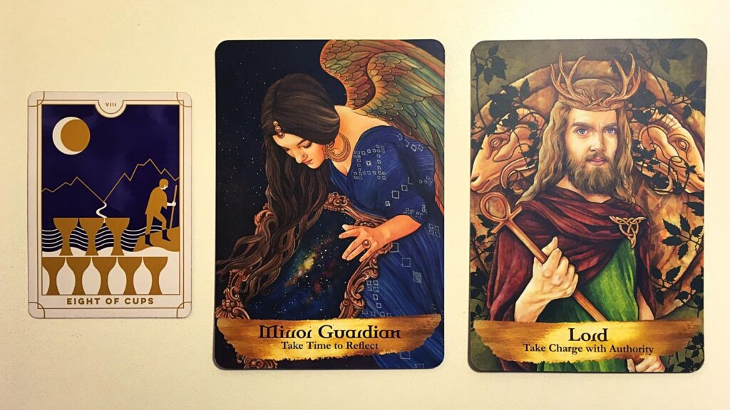 Tarot card and two oracle cards