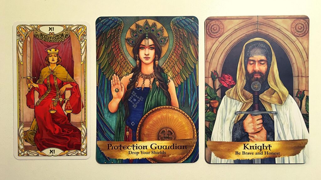 Justice card from the Golden Art Nouveau Tarot deck; the Protection Guardian and Knight cards from the Angels and Ancestors Deck