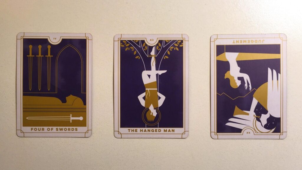 Four of Swords, The Hanged Man, and Judgement, Reversed cards from the Everyday Tarot deck