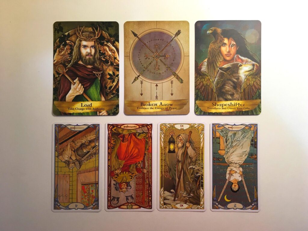 Three cards from the Angels and Ancestors Oracle deck and four cards from the Golden Art Nouveau Tarot deck