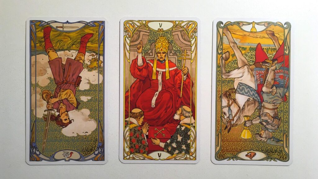 Page of Swords, Reversed, the Hierophant, and the Knight of Cups, Reversed