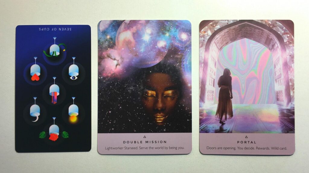 Card from the Mystic Mondays Tarot and two cards from the Starseed Oracle decks