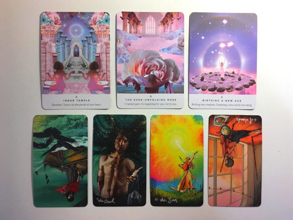 Three cards from the Work Your Light oracle deck