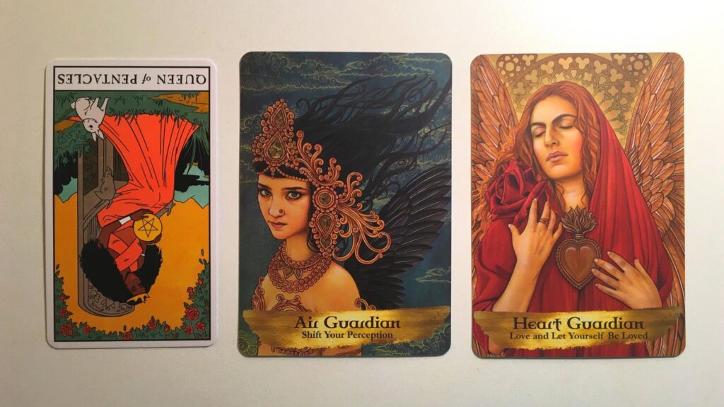 Card from the Modern Witch Tarot and two cards from the Angels and Ancestors Oracle deck