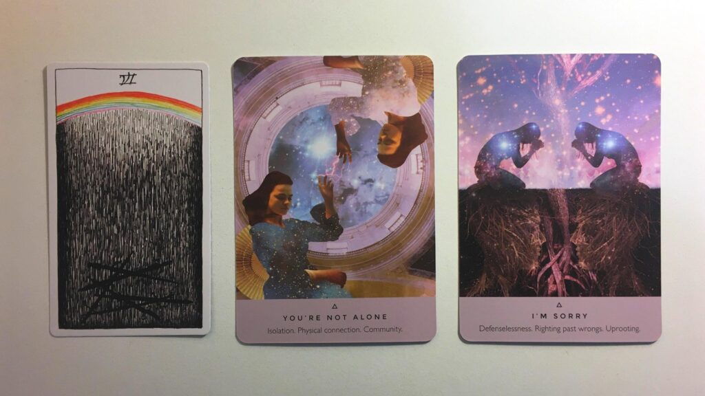 Card from the Wild Unknown Tarot deck and two cards from the Starseed Oracle deck