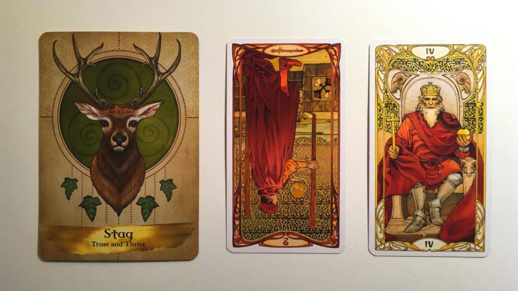 Card from the Angels and Ancestors Oracle deck and two cards from the Golden Art Nouveau Tarot deck