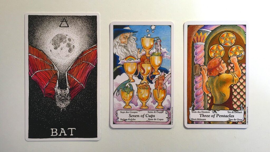 Card from the Animal Spirit Oracle and two cards from the Hanson-Roberts Tarot decks