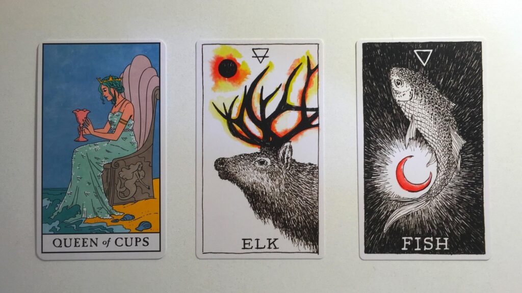 Card from the Modern Witch Tarot and two cards from the Animal Spirit Oracle decks