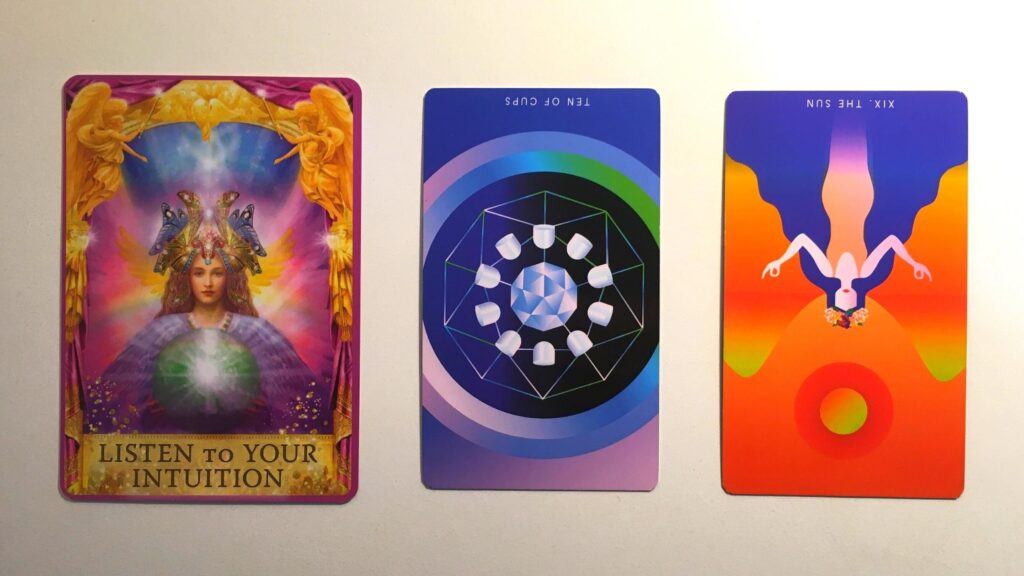 Card from the Angel Answers Oracle and two cards from the Mystic Mondays Tarot decks