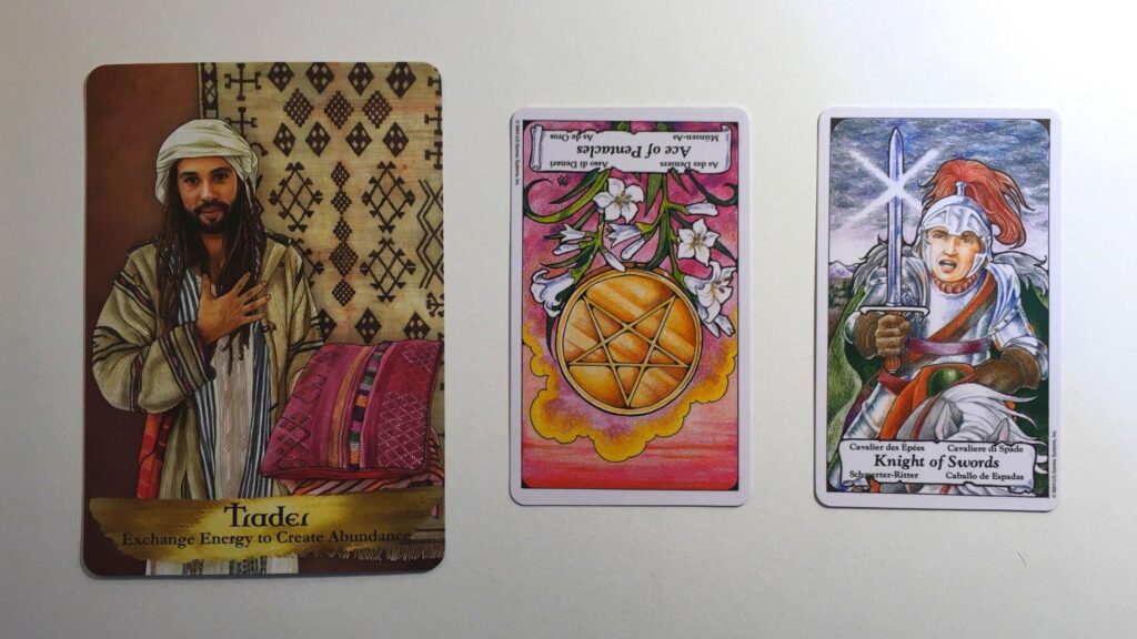 Card from the Angels and Ancestors Oracle and two cards from the Hanson-Roberts Tarot decks