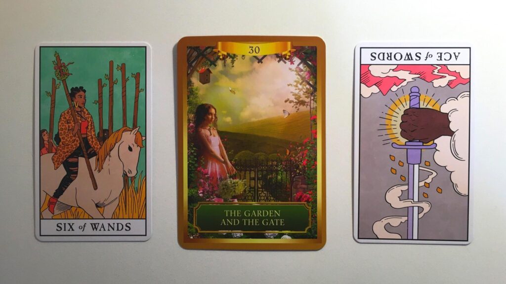 Two cards from the Modern Witch Tarot and a card from the Energy Oracle decks