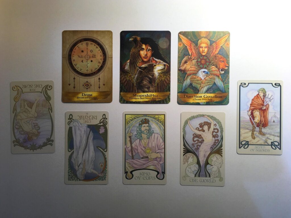 Cards from the Ethereal Visions Illuminated Tarot and Angels and Ancestors Oracle decks