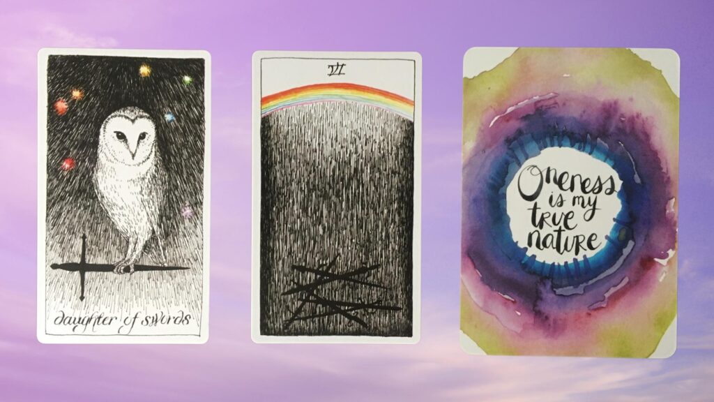 Cards from the Wild Unknown Tarot and the Universe Has Your Back Oracle decks