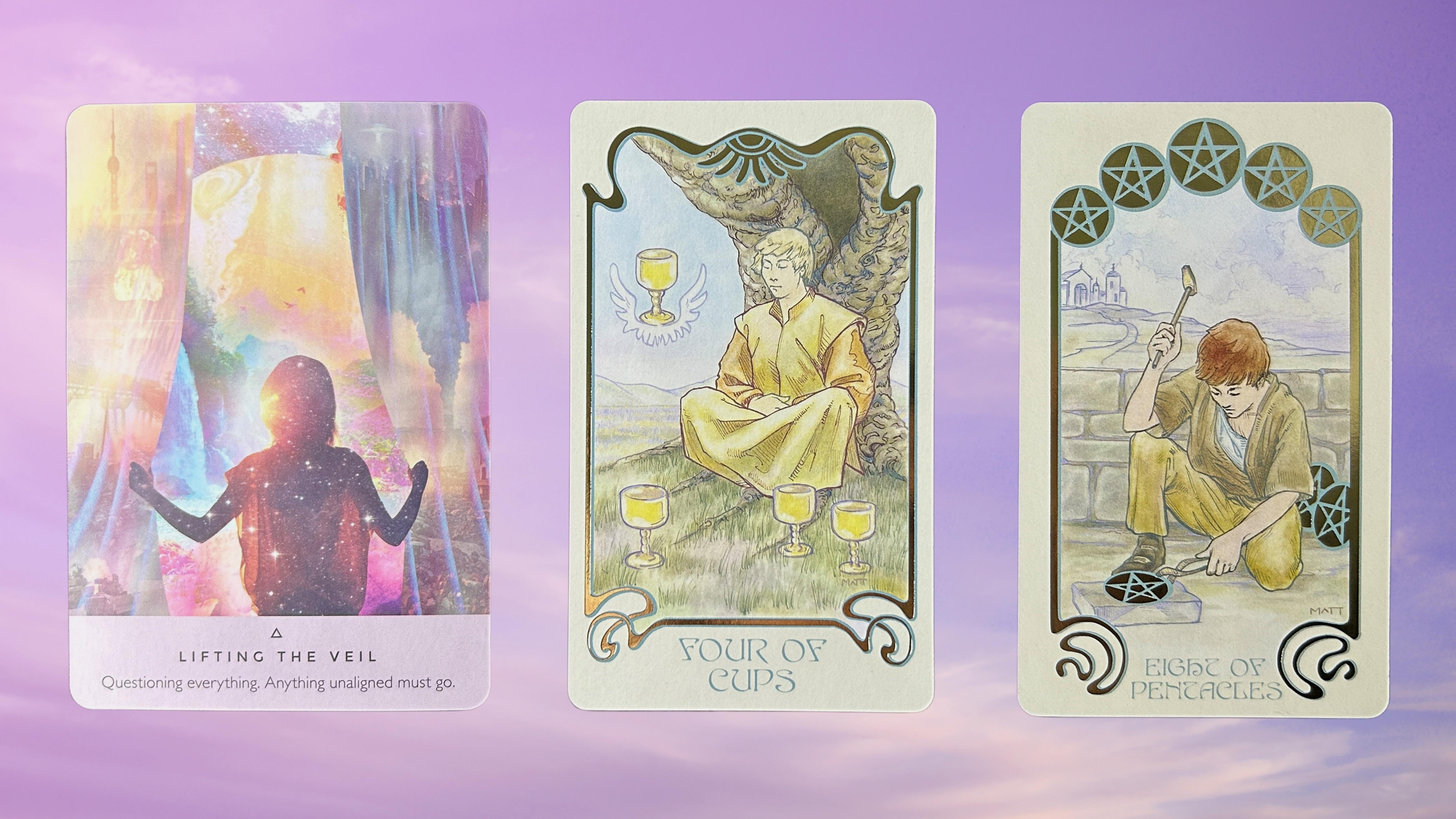 Cards from the Ethereal Visions Illuminated Tarot and the Starseed Oracle decks