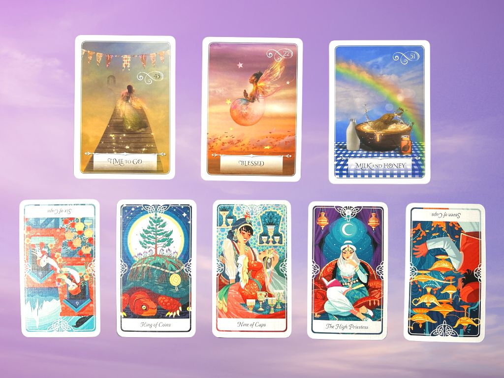 Cards from the Tarot of the Divine and the Wisdom of the Oracle decks