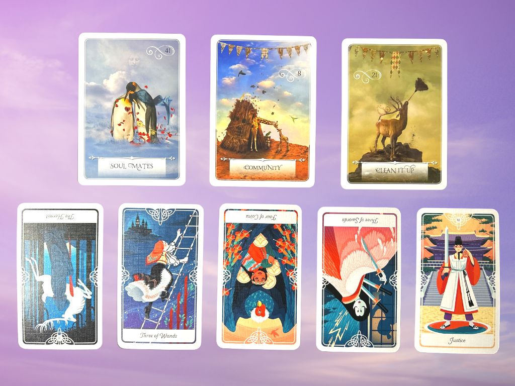 Cards from the Tarot of the Divine and the Wisdom of the Oracle decks