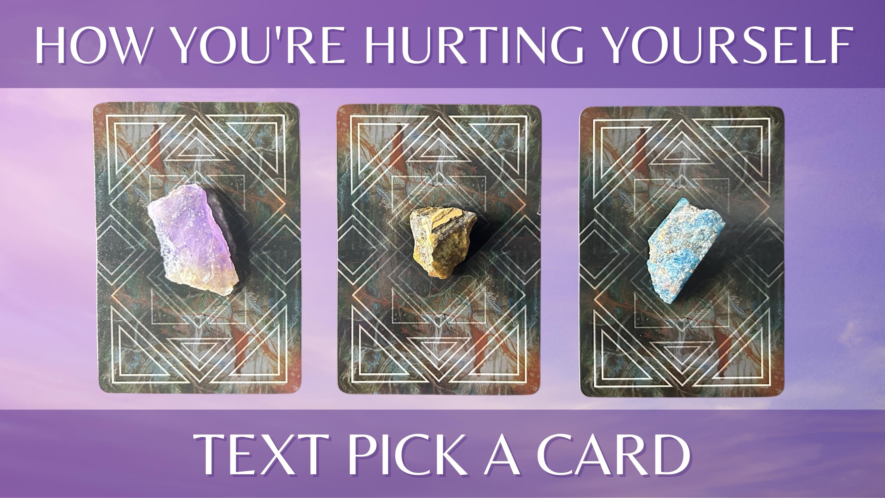 Three oracle card piles with crystals on them