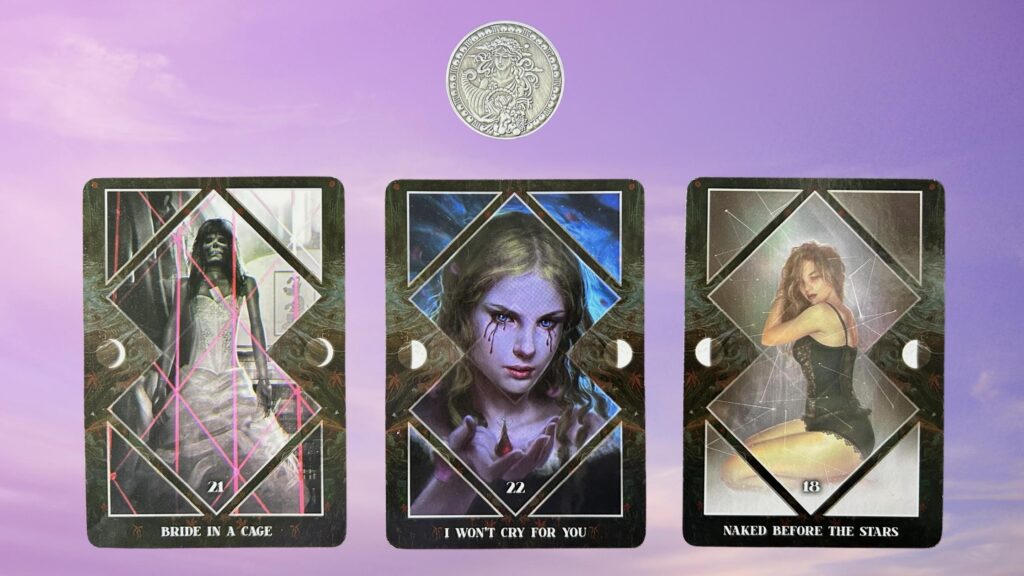 Cards from the Dark Mirror Oracle and a Zodiac Coin