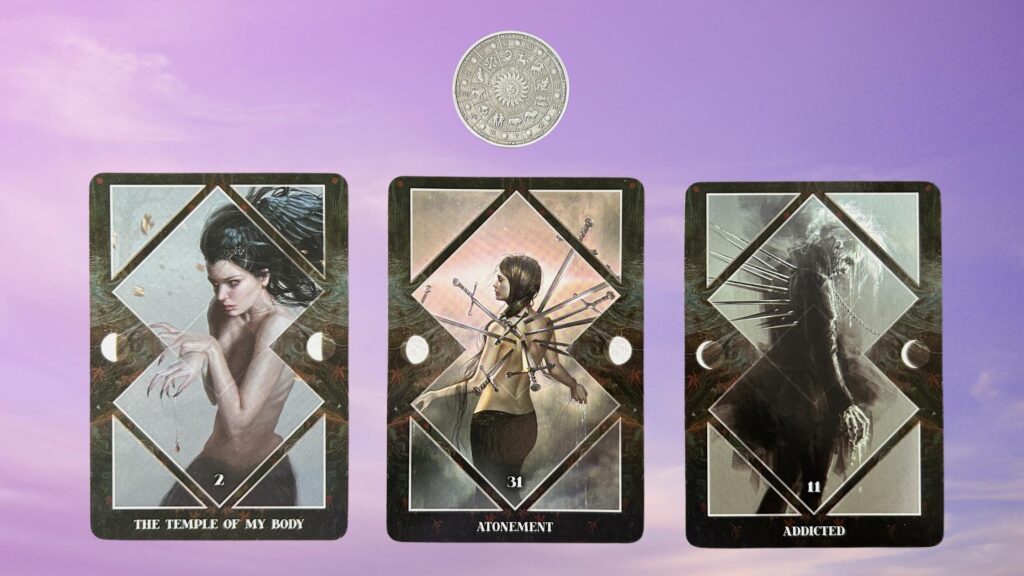 Cards from the Dark Mirror Oracle and a Zodiac Coin