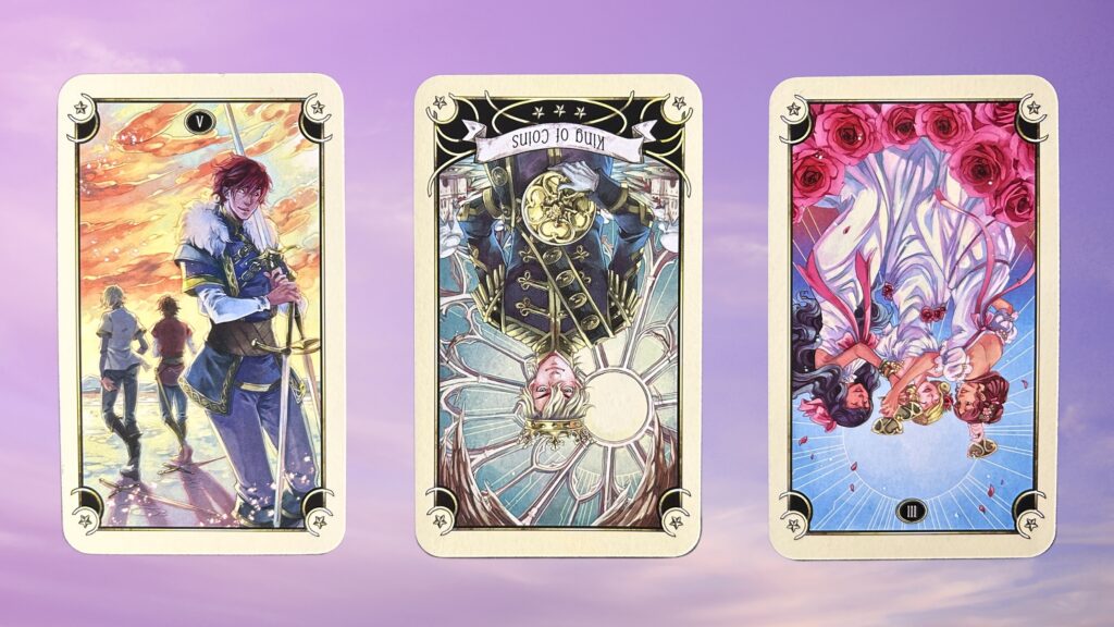 Cards from the Mystical Manga Tarot deck: Five of Swords, King of Coins, and Three of Cups